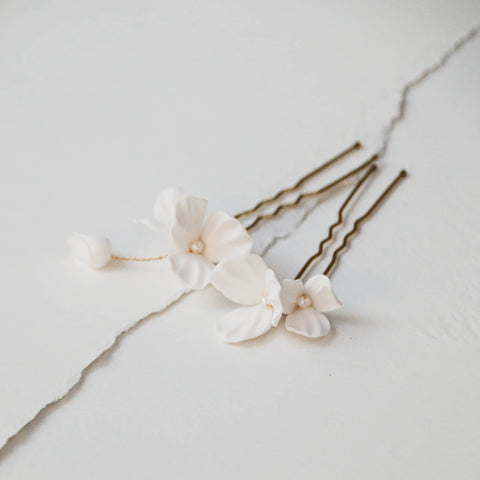 White hairpins with flowers