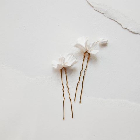 White hairpins with flowers