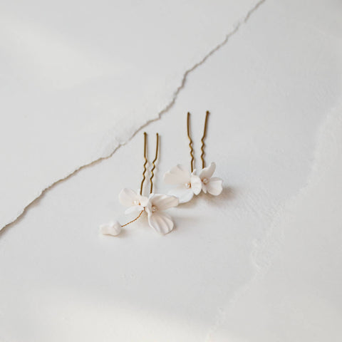 White hairpins with flowers